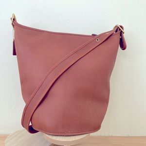 Coach tan leather large duffle sac in excellent condition